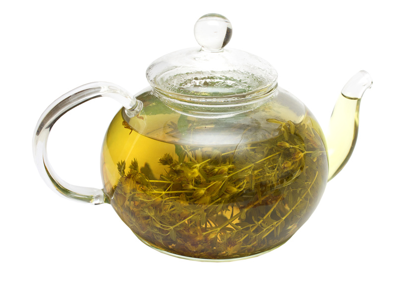 Glass teapot with Hypericum